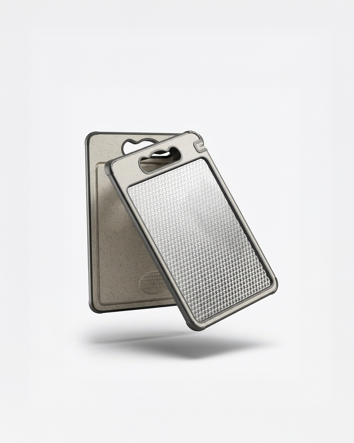 Metallic grater on a light gray background