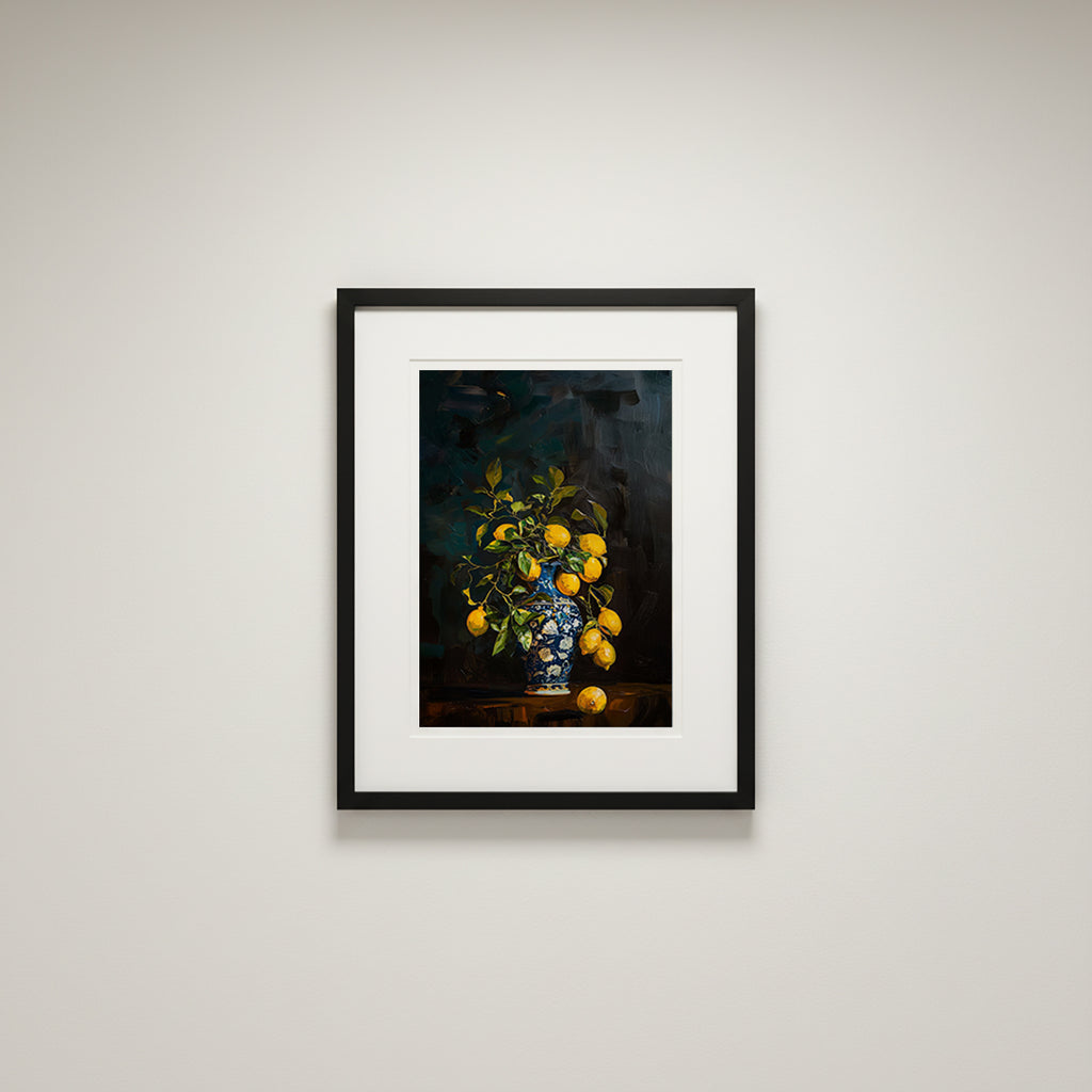Framed artwork of a still life with lemons and a vase on a white wall.