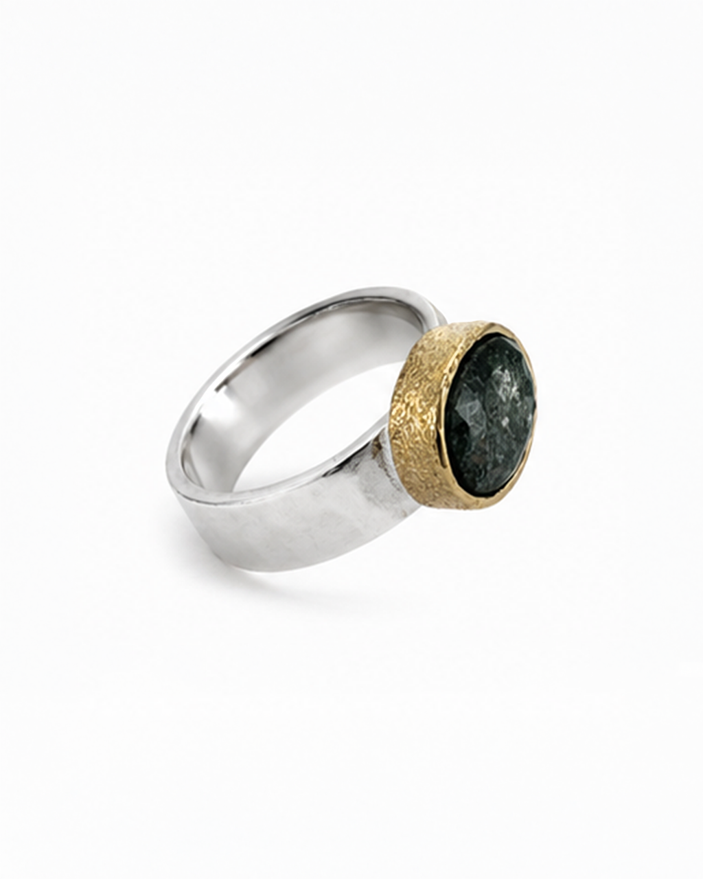 Oval green gemstone signet ring featuring a polished sterling silver band and softly brushed gold bezel. The dark moss green faceted stone sits in a minimalist contemporary setting, photographed against a clean white background.