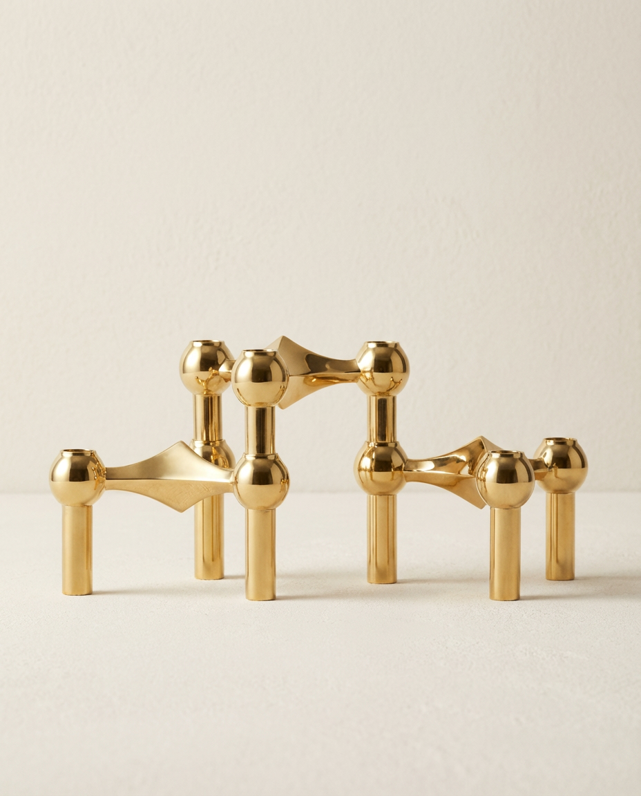 Gold decorative items on a beige background