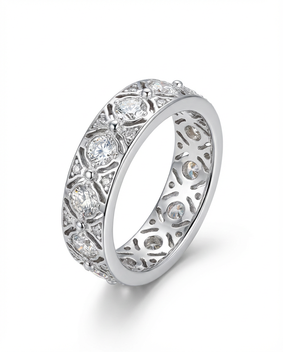 Silver ring with diamond accents on a white background