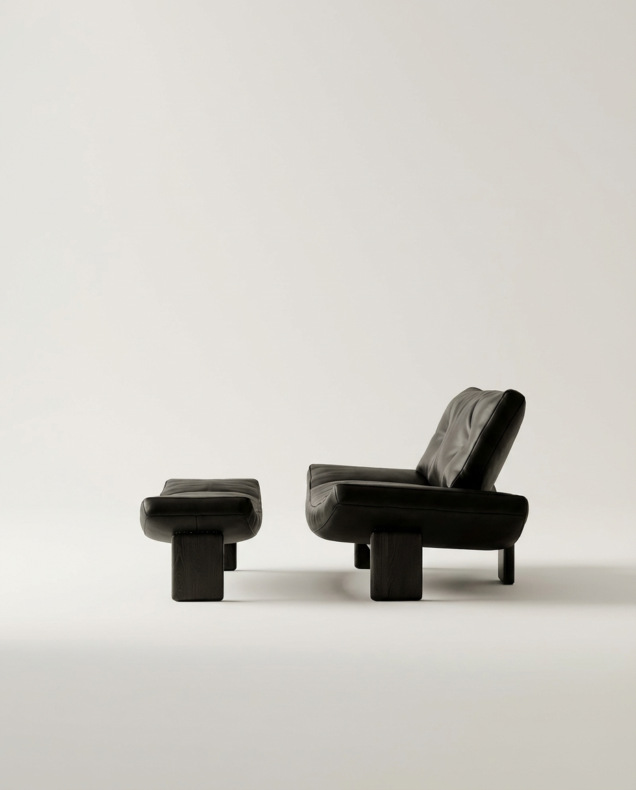 Modern black chair and ottoman on a white background