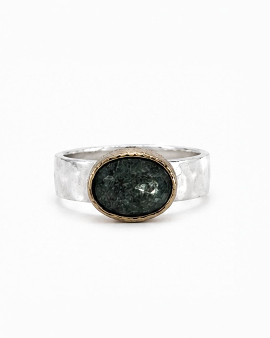 Oval green gemstone signet ring featuring a polished sterling silver band and softly brushed gold bezel. The dark moss green faceted stone sits in a minimalist contemporary setting, photographed against a clean white background.