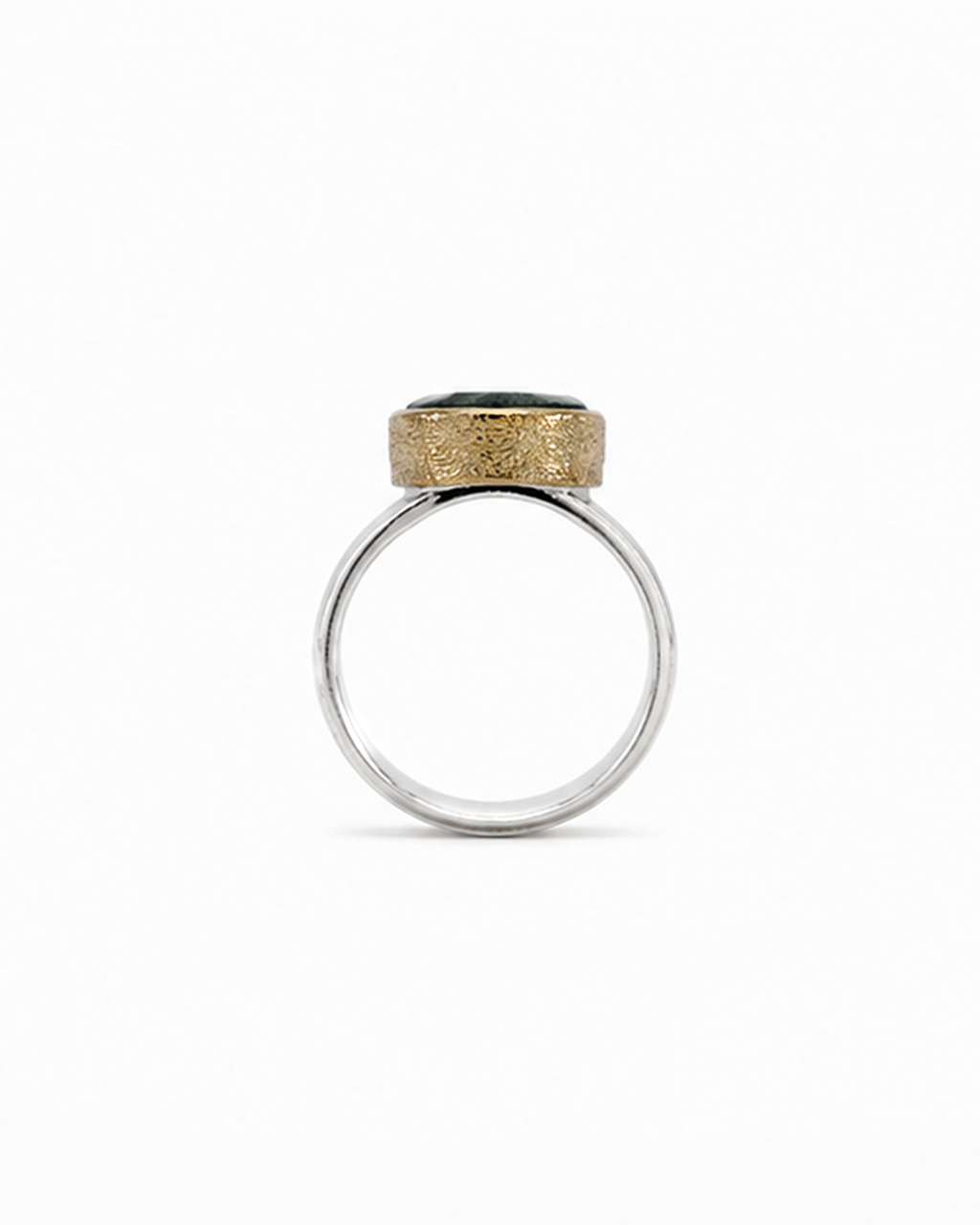 Oval green gemstone signet ring featuring a polished sterling silver band and softly brushed gold bezel. The dark moss green faceted stone sits in a minimalist contemporary setting, photographed against a clean white background.
