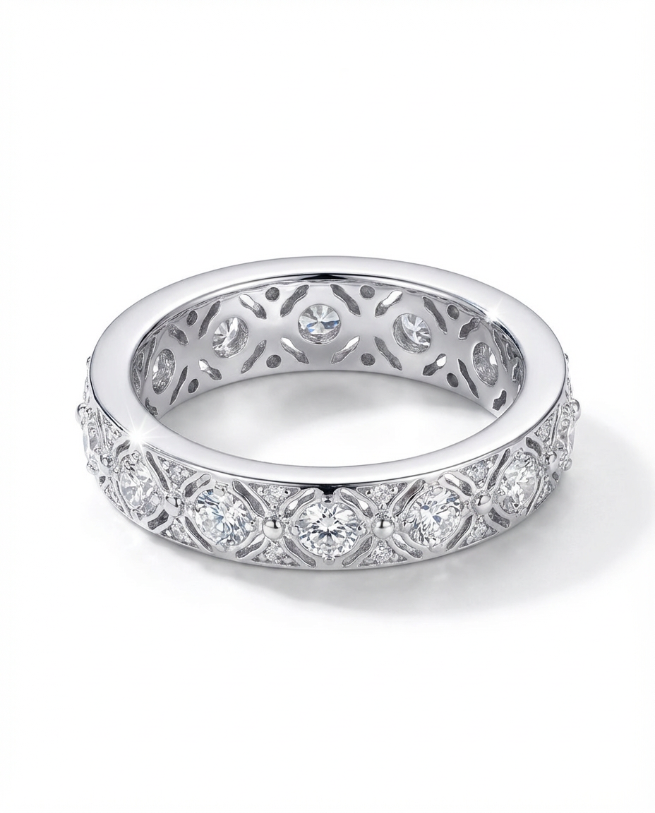 Silver ring with diamond accents on a white background