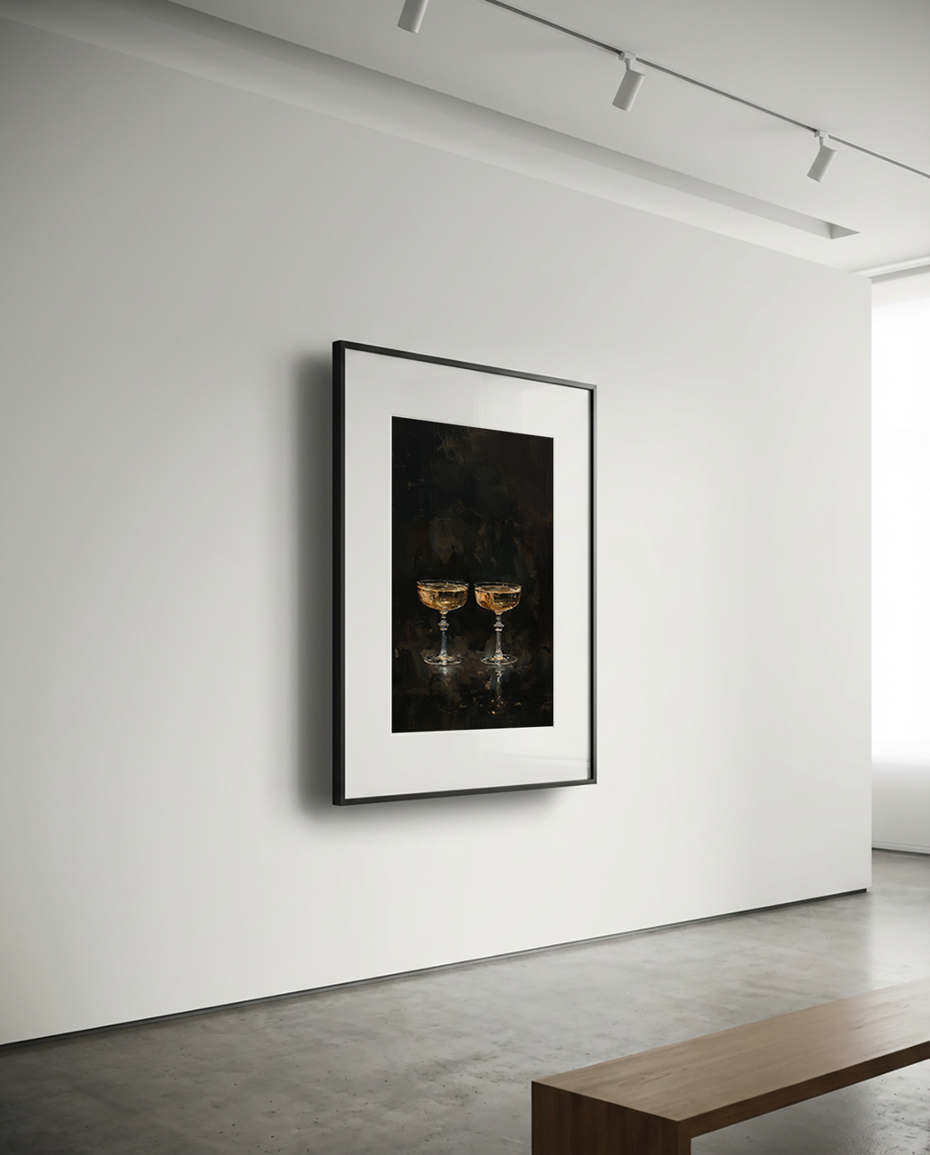 Framed artwork of two champagne glasses on a white wall in a modern room.