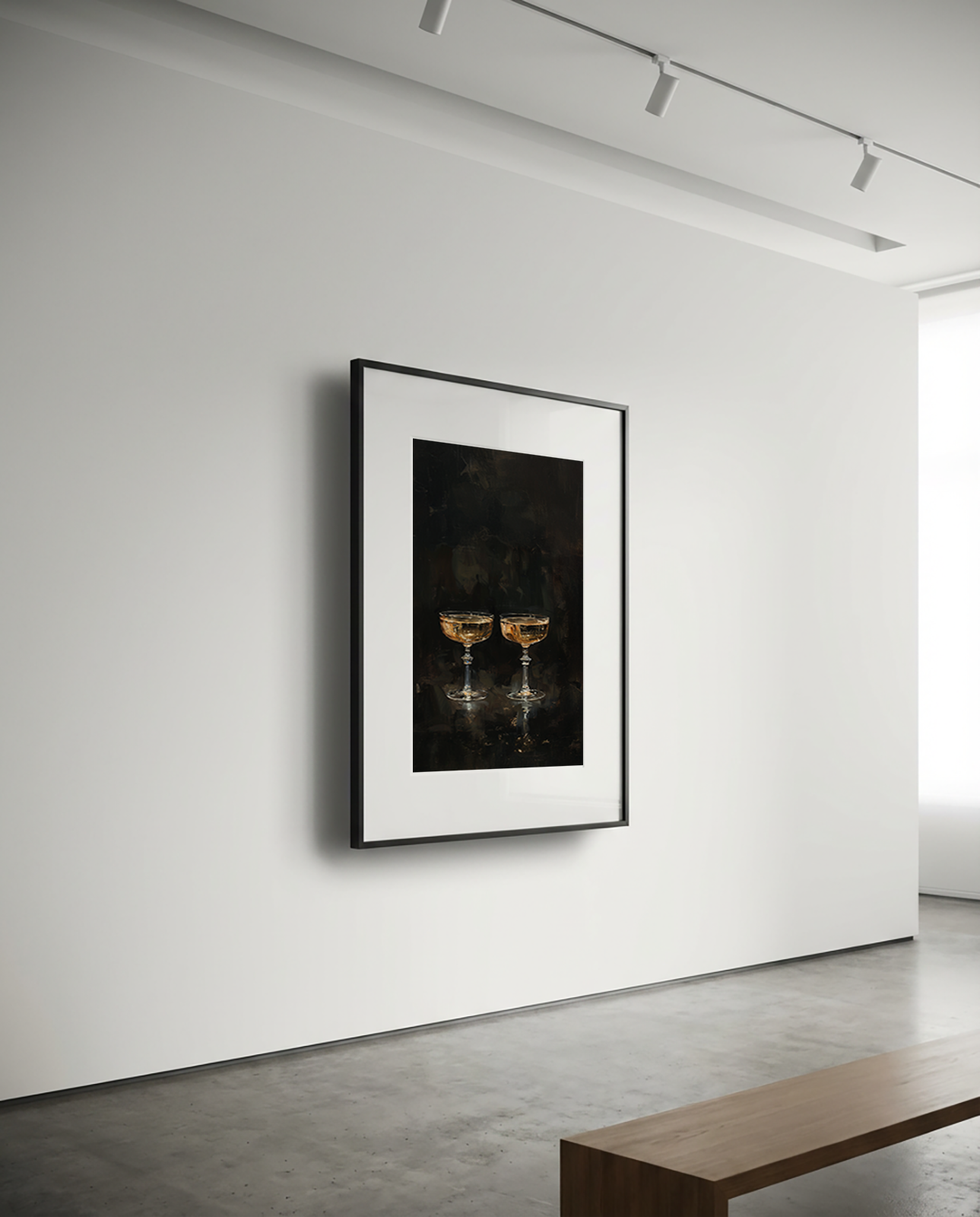 Framed artwork of two champagne glasses on a white wall in a modern room.