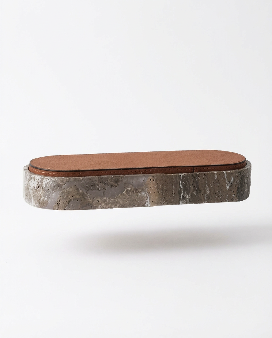 Marble-patterned soap dish with a brown leather lid on a white background