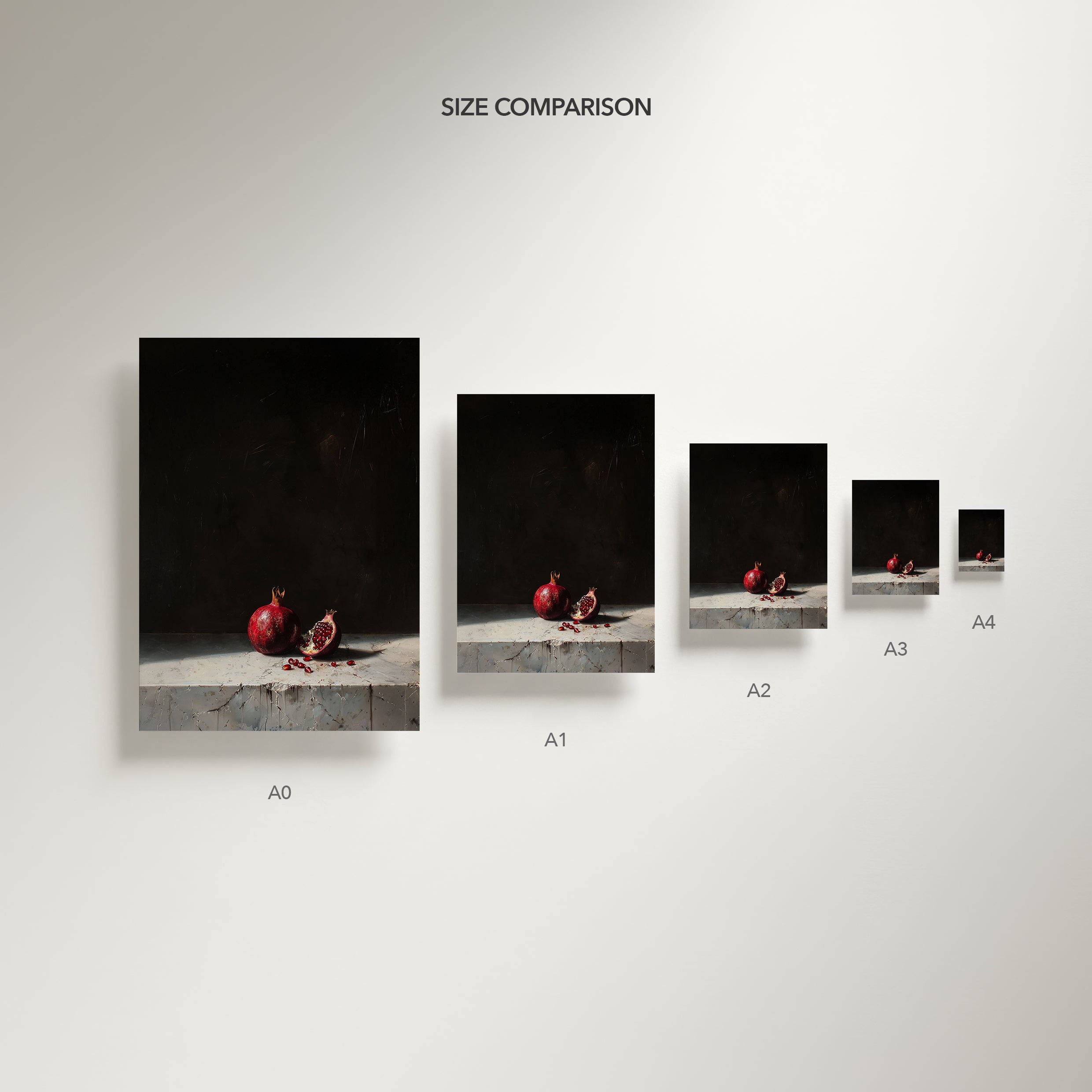 Size comparison chart of framed artworks on a plain wall.