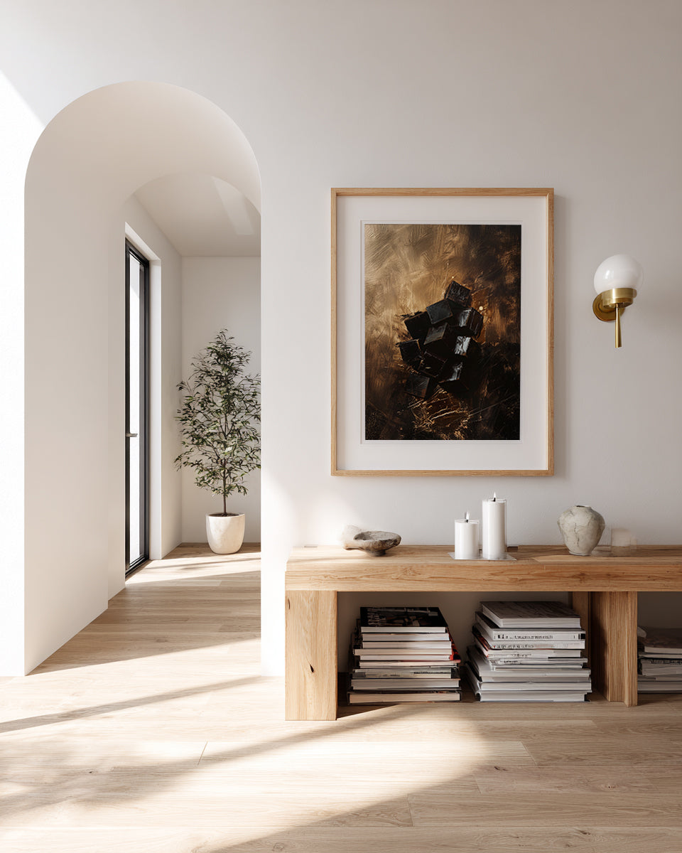 Modern interior with a wooden console table, framed artwork, and decorative items.