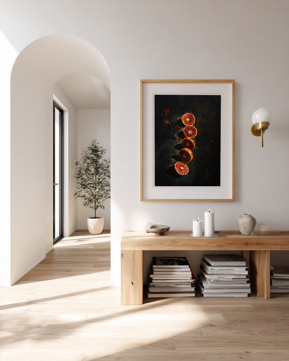 Modern interior with a wooden console table and framed artwork on the wall.