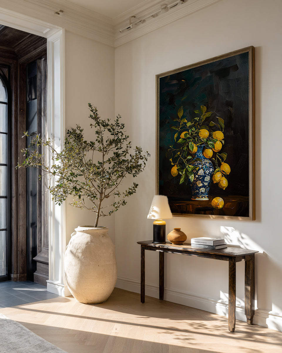 Living room with a vase, table, and painting on the wall